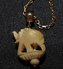 Photo of gold elephant pendant